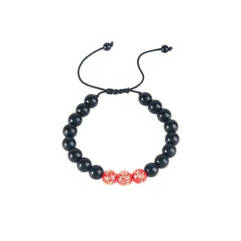 10 mm schwarzes Obsidian-Stärkearmband mit Glowstone