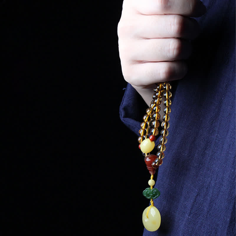 Mala-Armband mit 108 Perlen aus Citrin und Bernstein für den Frieden