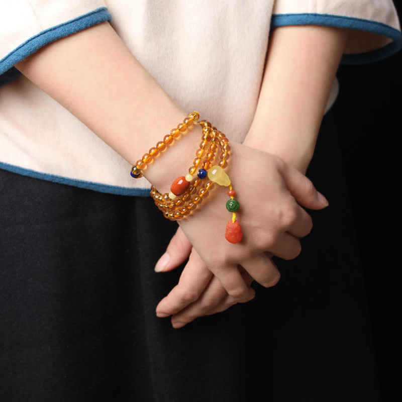 Mala-Armband mit 108 Perlen aus Citrin und Bernstein für den Frieden