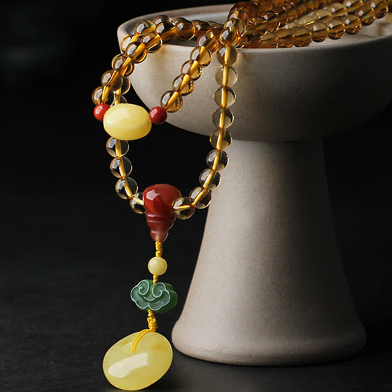 Mala-Armband mit 108 Perlen aus Citrin und Bernstein für den Frieden