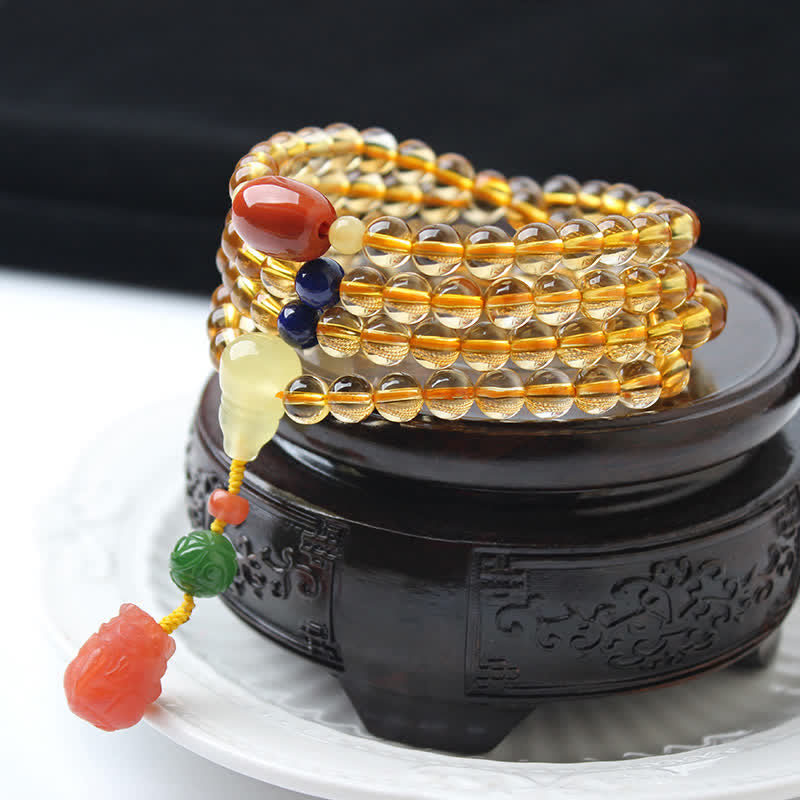 Mala-Armband mit 108 Perlen aus Citrin und Bernstein für den Frieden