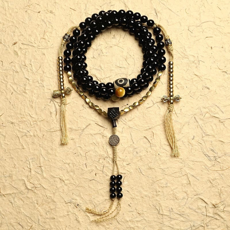 Mala-Armband mit 108 Perlen aus schwarzem Onyx und Schutzedelstein