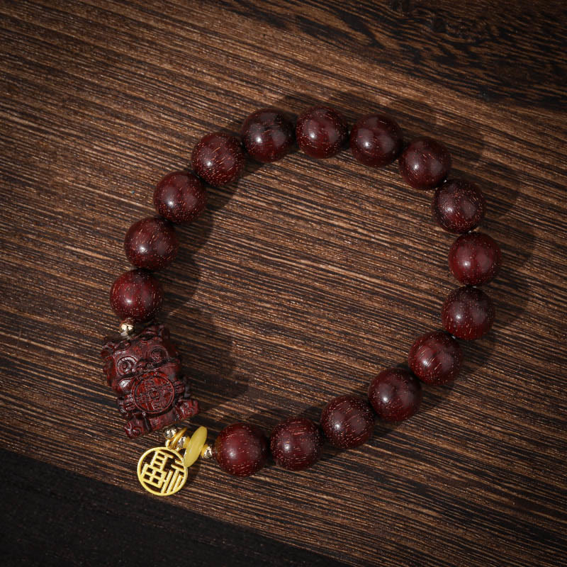 10 mm kleines spirituelles Armband aus rotem Sandelholz mit goldenem Schwalbenanhänger für Ruhe