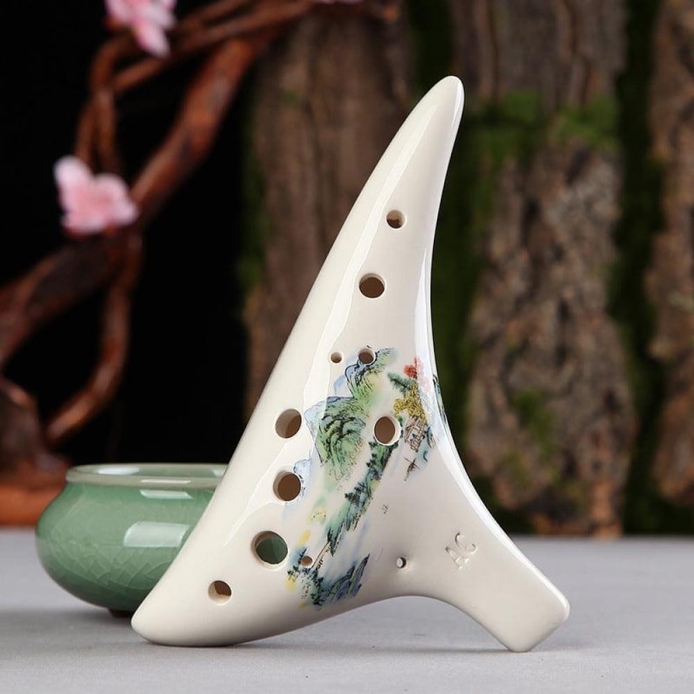 White ceramic 12 Hole Alto C Painted Ocarina with floral design and finger holes