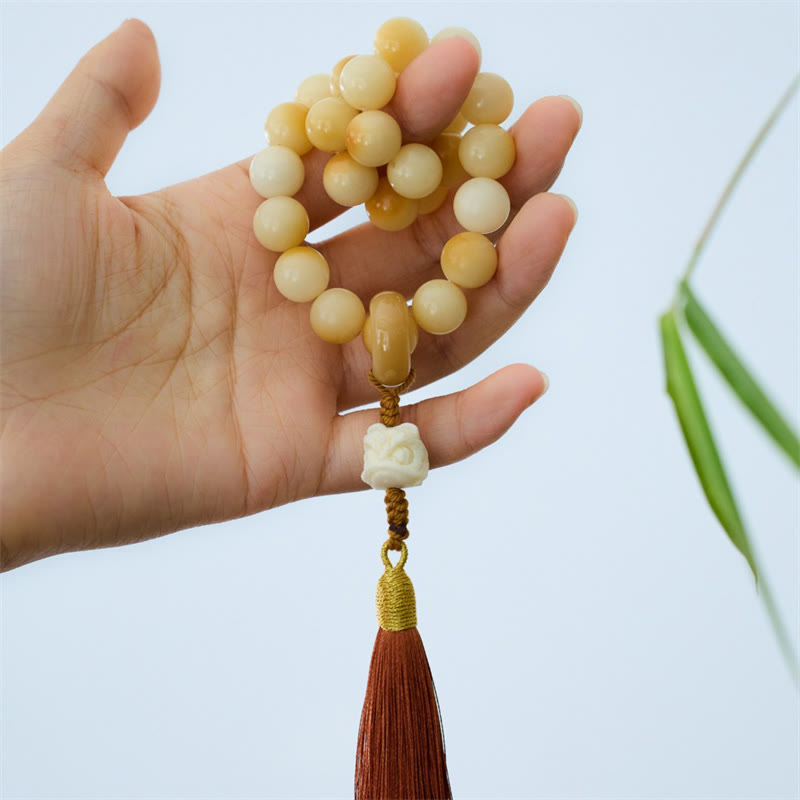 12 mm Bodhi Seed Handgelenk-Mala mit tanzendem Löwen-Anhänger für Harmonie