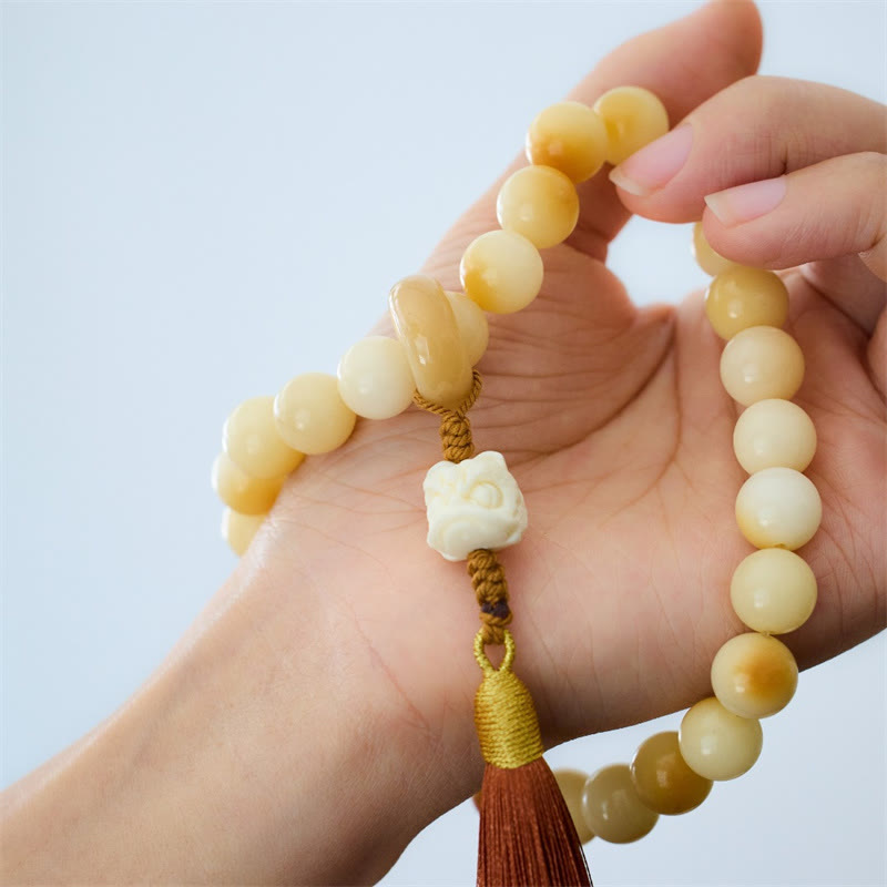 12 mm Bodhi Seed Handgelenk-Mala mit tanzendem Löwen-Anhänger für Harmonie