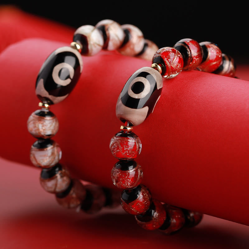 12 mm Neun-Augen-Dzi-Perlenarmband mit spirituellem Reichtum