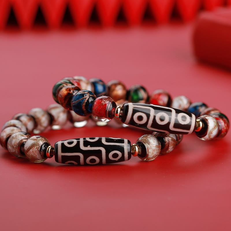 12 mm Neun-Augen-Dzi-Perlenarmband mit spirituellem Reichtum