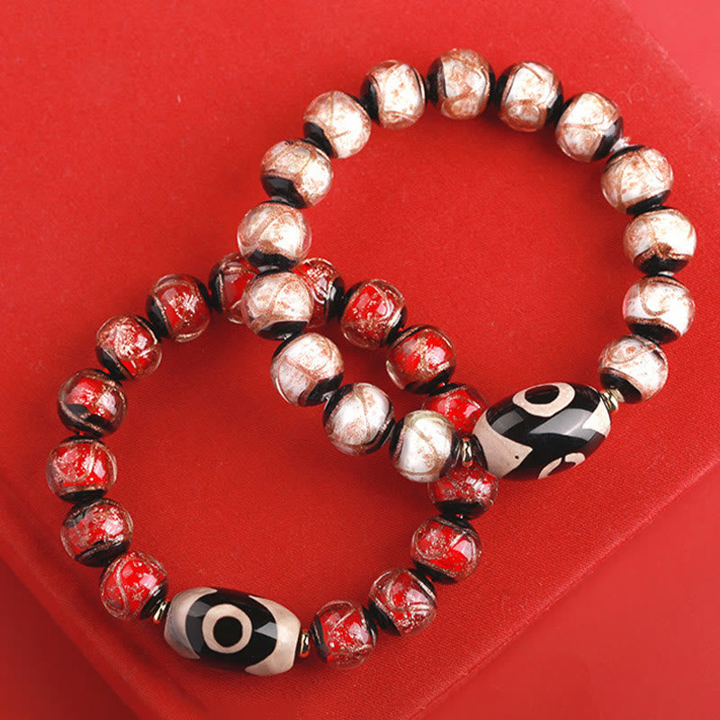 12 mm Neun-Augen-Dzi-Perlenarmband mit spirituellem Reichtum