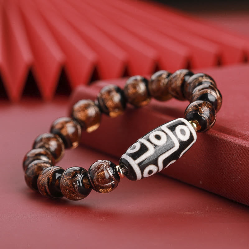 12 mm Neun-Augen-Dzi-Perlenarmband mit spirituellem Reichtum