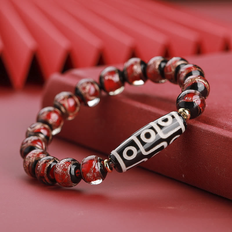 12 mm Neun-Augen-Dzi-Perlenarmband mit spirituellem Reichtum