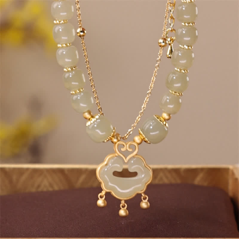 14 Karat vergoldetes Hetian-Jade-Wunschschloss-Glockenkettenarmband