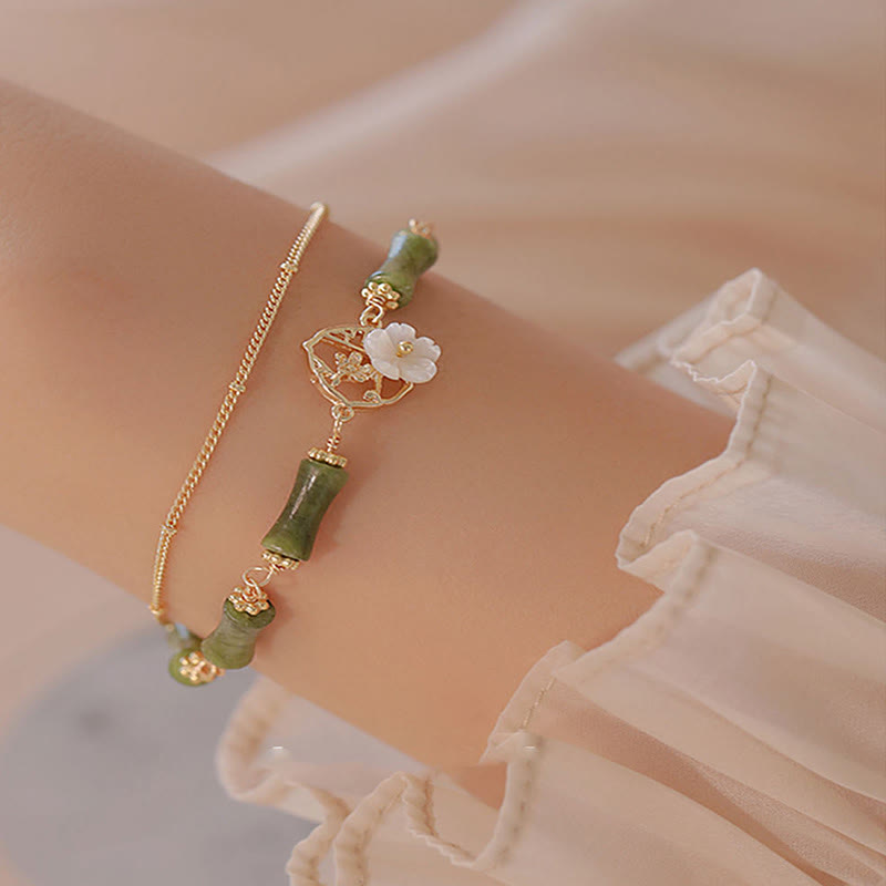 14 Karat vergoldetes spirituelles Peridot-Armband mit Bambusblüte