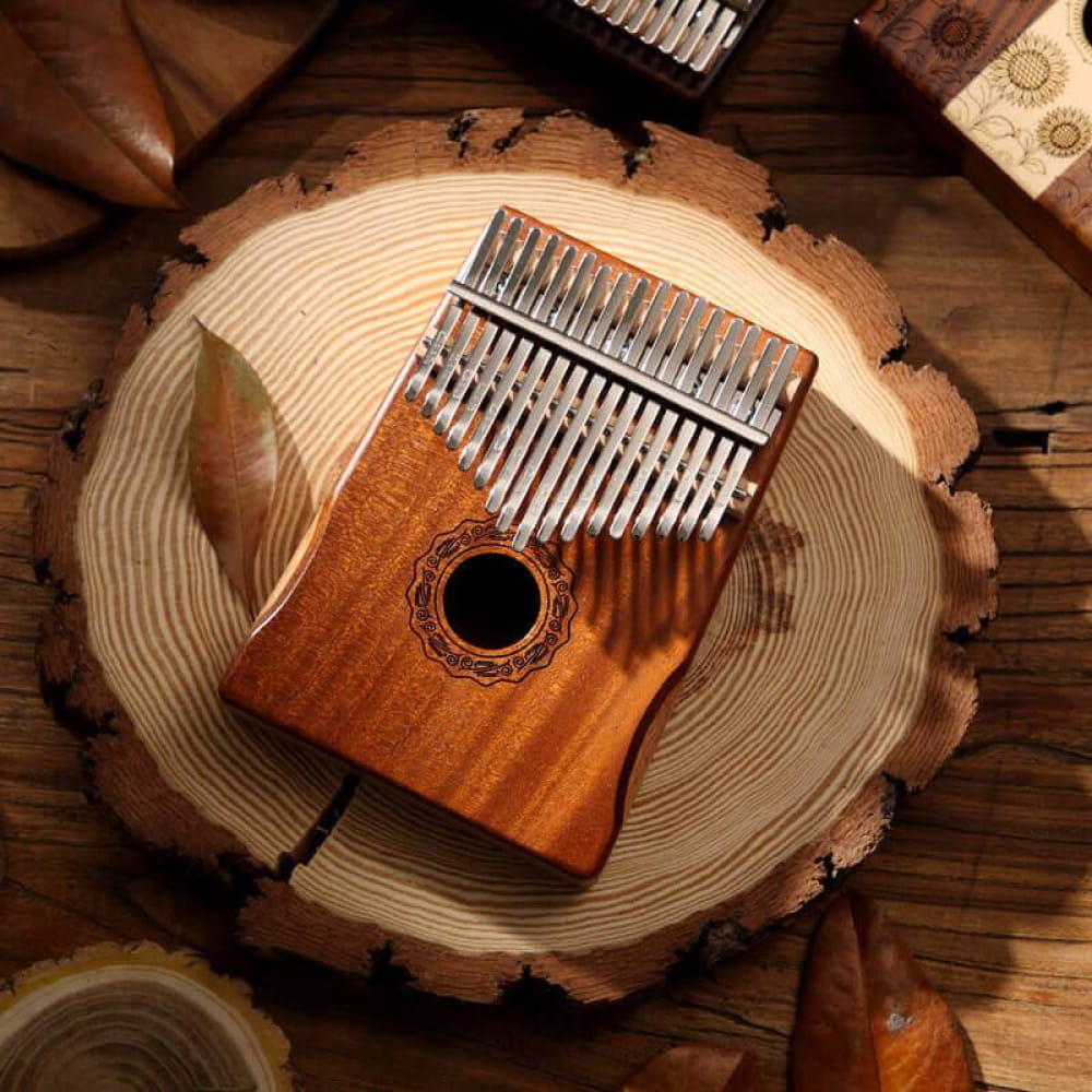 17 Key Mahogany Kalimba with metal tines and decorative round sound hole