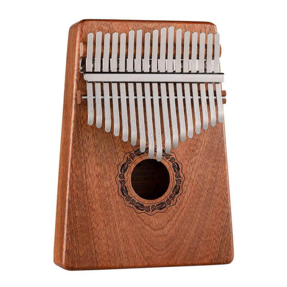 Wooden Kalimba thumb piano with metal tines and decorative sound hole in yellow sandalwood