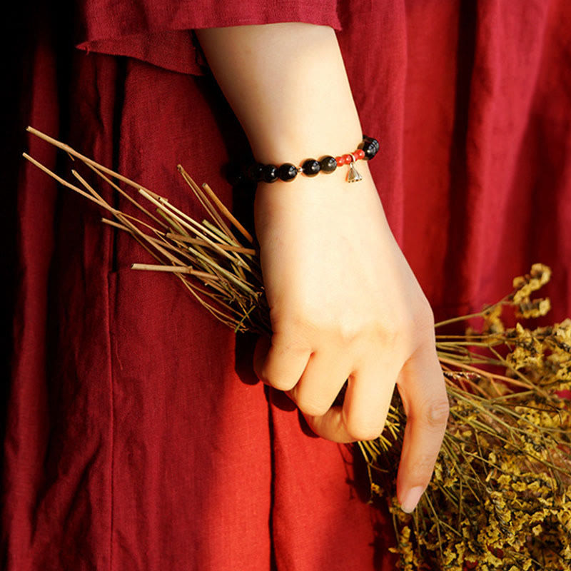 8 mm schwarzes Obsidian-Lotus-Charm-Stärkearmband