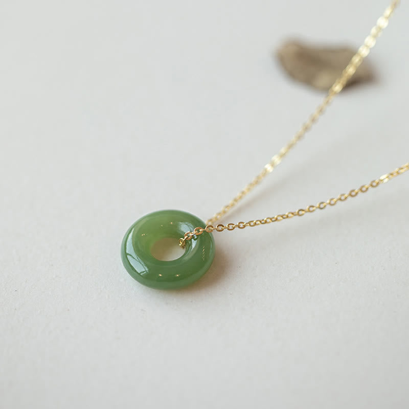 Hetian Jade Peace Buckle Halskette aus Sterlingsilber und Gold
