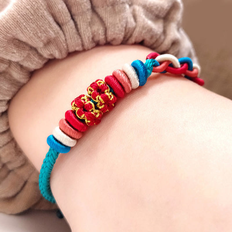 Vierreihiges Pfirsichblüten-Verbindungsarmband mit roter Schnur