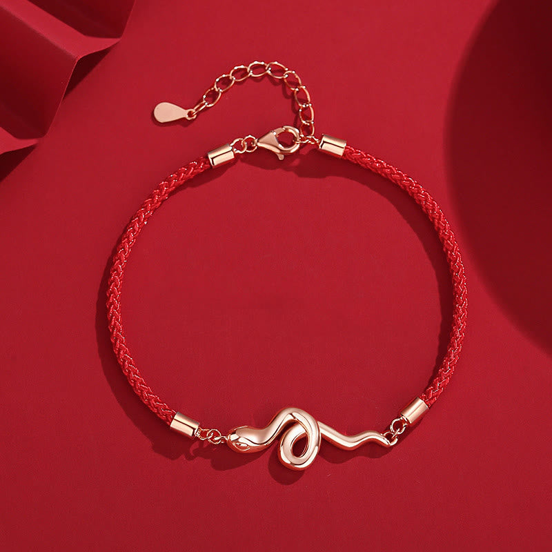 Silbernes Schlangenjahr-Armband mit roter Schnur