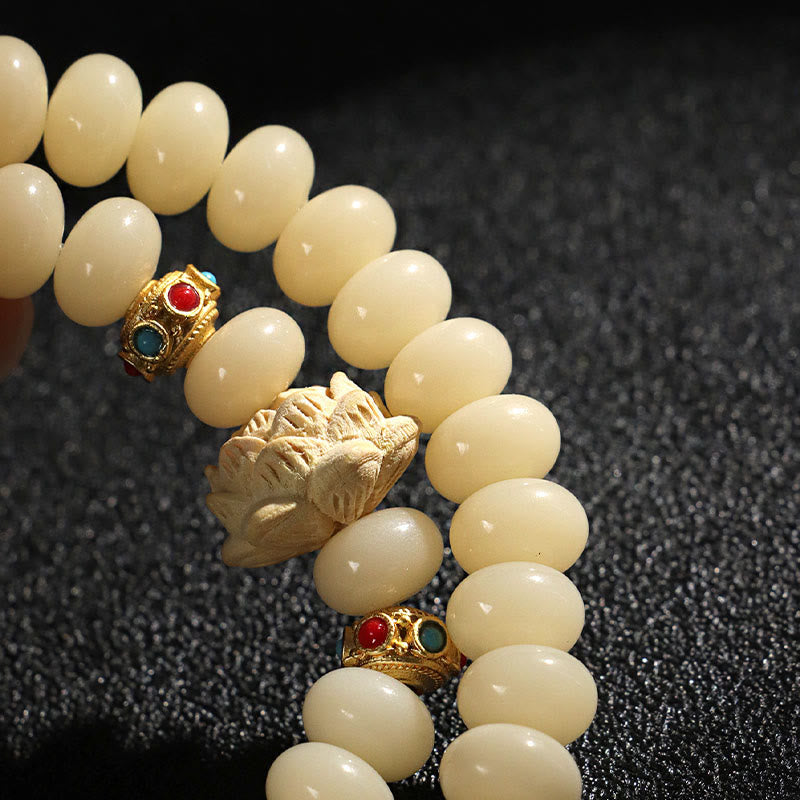 Bodhi Seed Pfirsichholz Lotus Reichtum Doppelwickelarmband