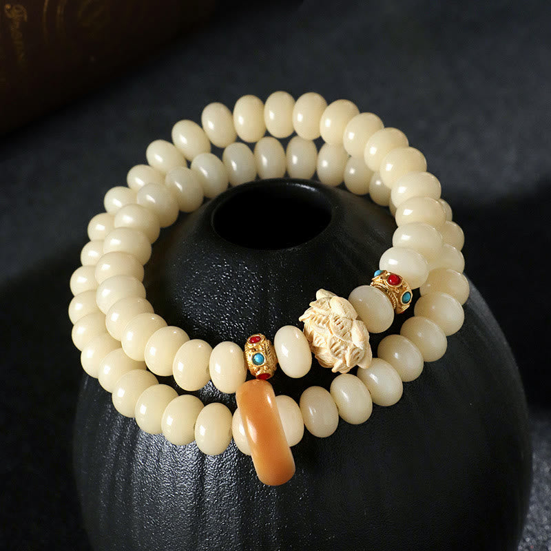 Bodhi Seed Pfirsichholz Lotus Reichtum Doppelwickelarmband