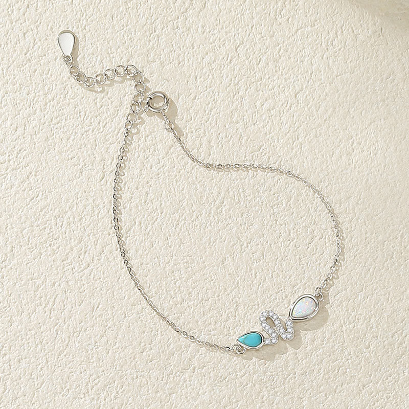 Türkisfarbenes Opal-Schlangenschutzarmband 2025