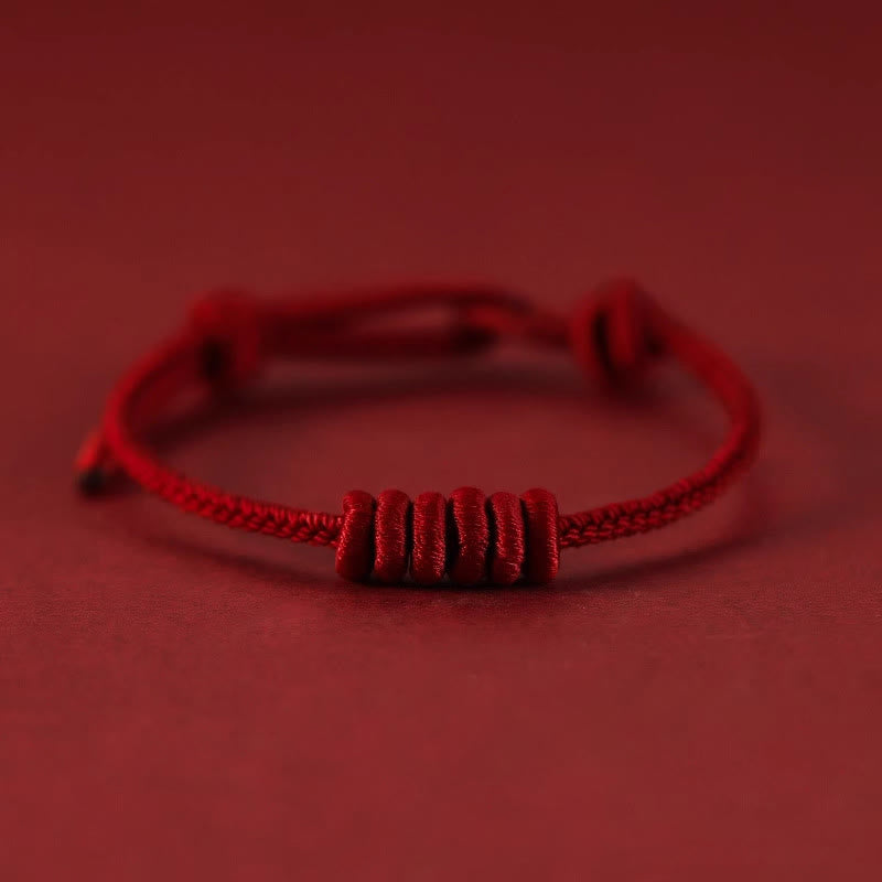Rotes Armband mit achtsträngigem Seil