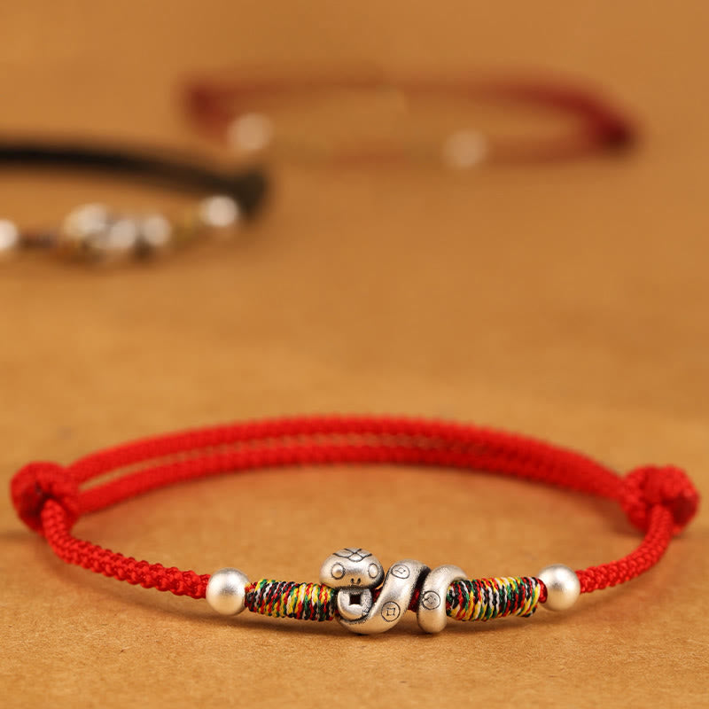 Fußkettchen mit Schlangenmotiv aus Sterlingsilber mit roter Schnur
