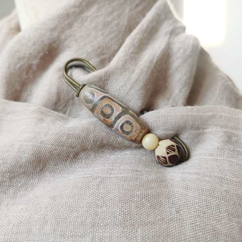 Neun-Augen-Dzi-Perle Bodhi-Samen Lotus Schutzbrosche