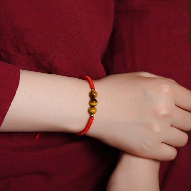 8 mm großes Schutzarmband mit drei Perlen und Tigerauge, mit rotem oder schwarzem Seil