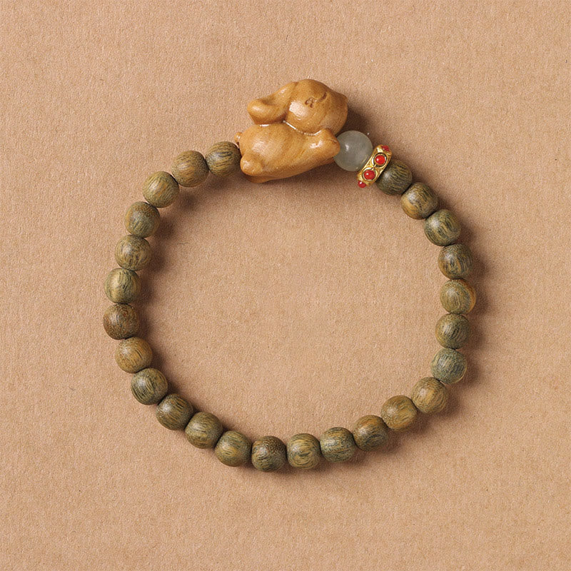6 mm grünes Sandelholz-Armband mit positivem Kaninchen