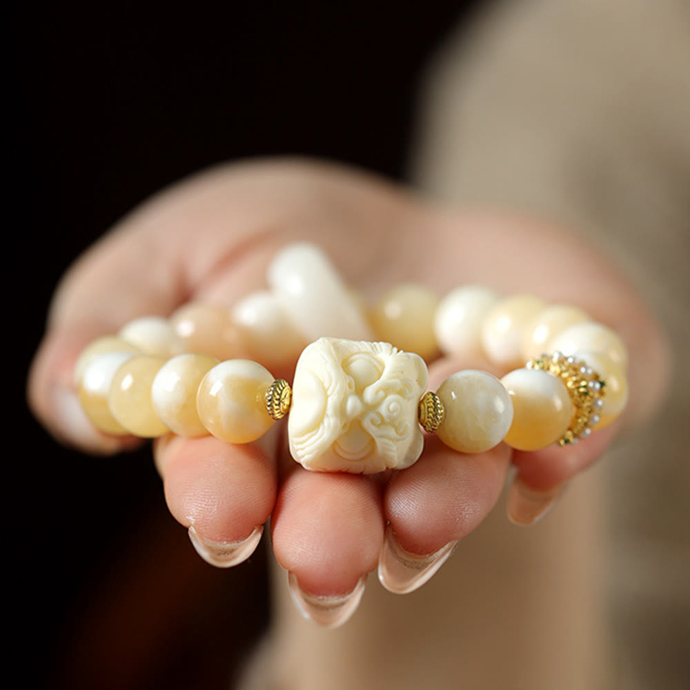 Elfenbeinfarbenes Frucht-Amber-Grau-Achat-Armband für Selbstvertrauen