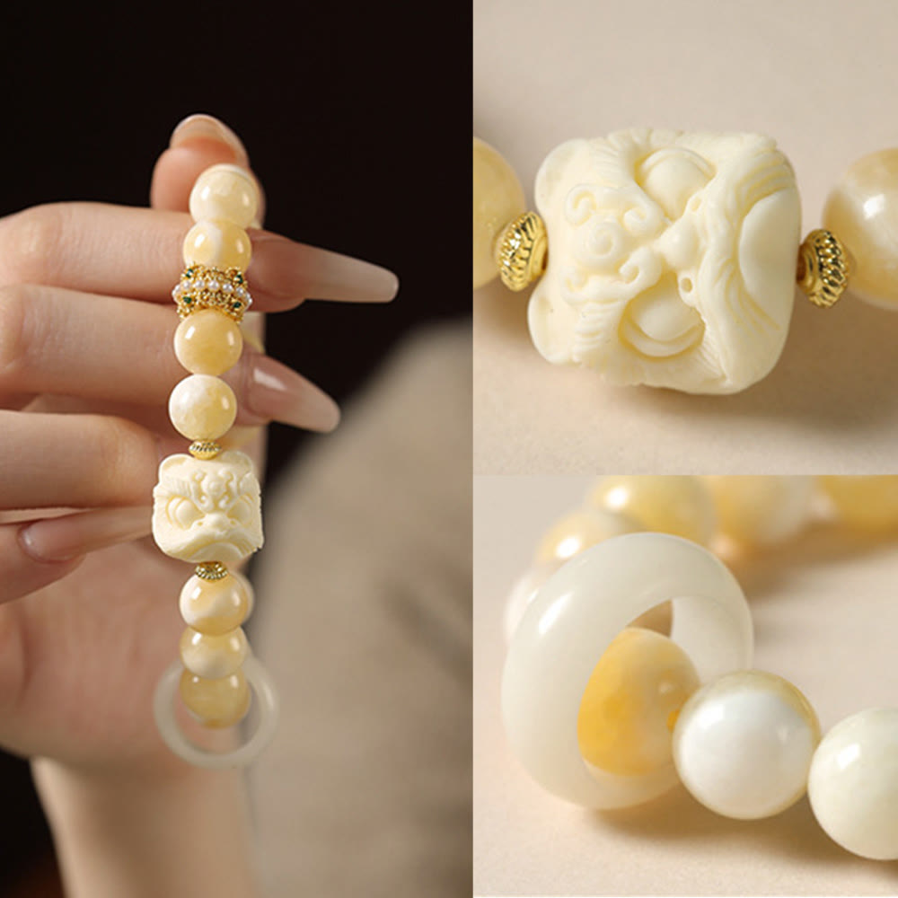 Elfenbeinfarbenes Frucht-Amber-Grau-Achat-Armband für Selbstvertrauen