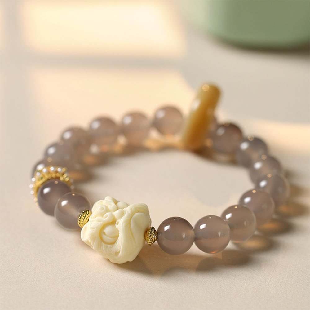 Elfenbeinfarbenes Frucht-Amber-Grau-Achat-Armband für Selbstvertrauen