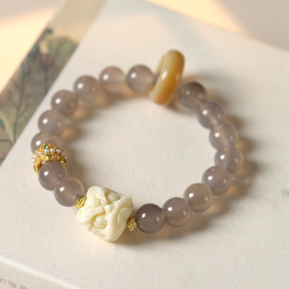 Elfenbeinfarbenes Frucht-Amber-Grau-Achat-Armband für Selbstvertrauen