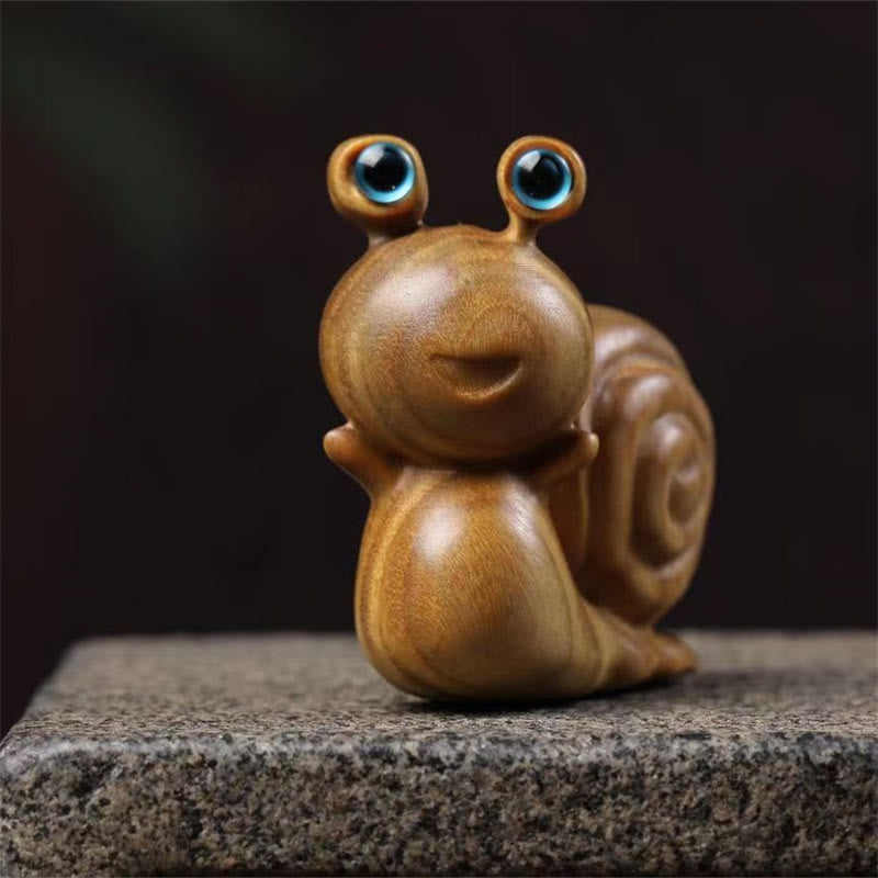 Mini-Zen-Dekor aus grüner Sandelholzschnecke für positive Energie