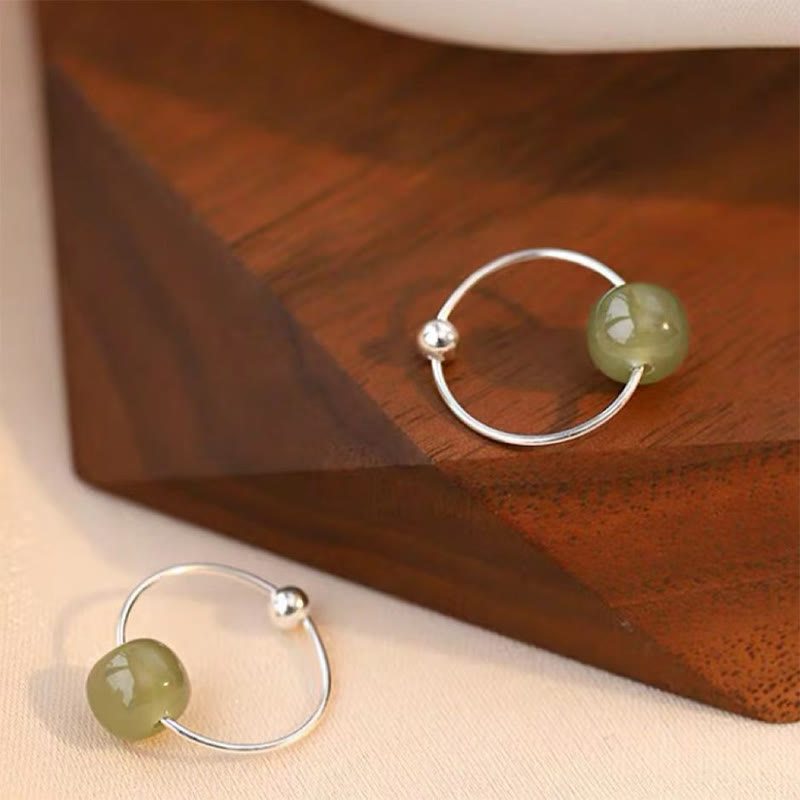 Ohrringe aus Sterlingsilber mit Hetian-Jade und Glücksbringer