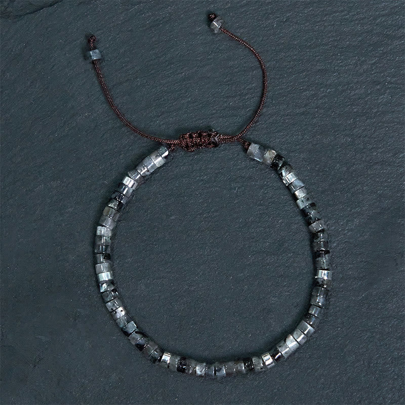 Schwarzes Glitzerstein-Mutarmband für spirituellen Schutz