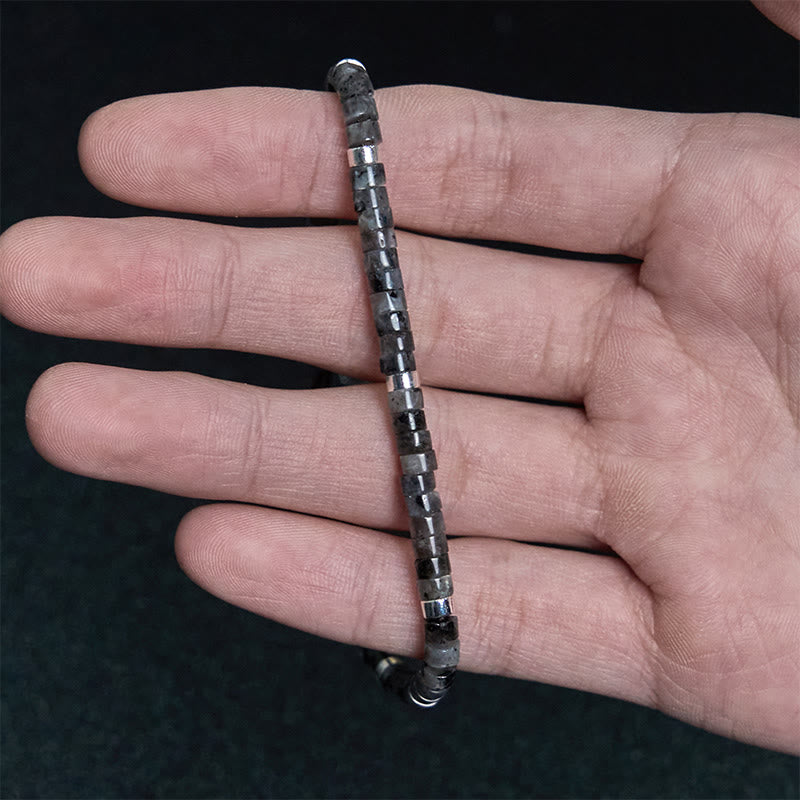 Schwarzes Glitzerstein-Mutarmband für spirituellen Schutz