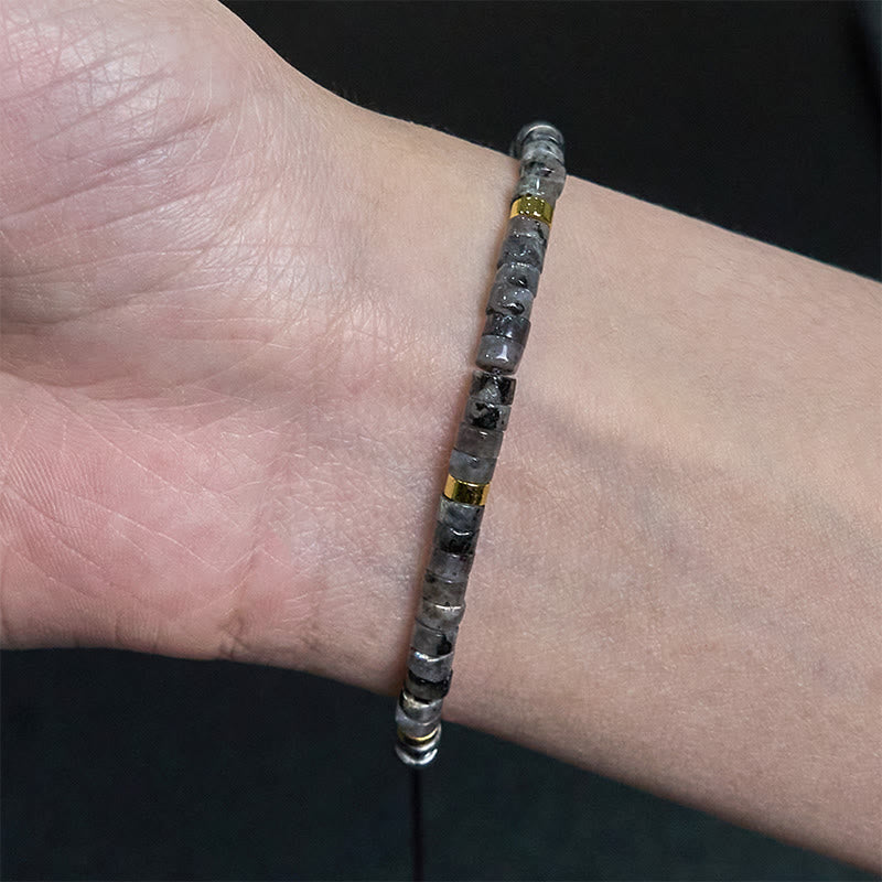 Schwarzes Glitzerstein-Mutarmband für spirituellen Schutz