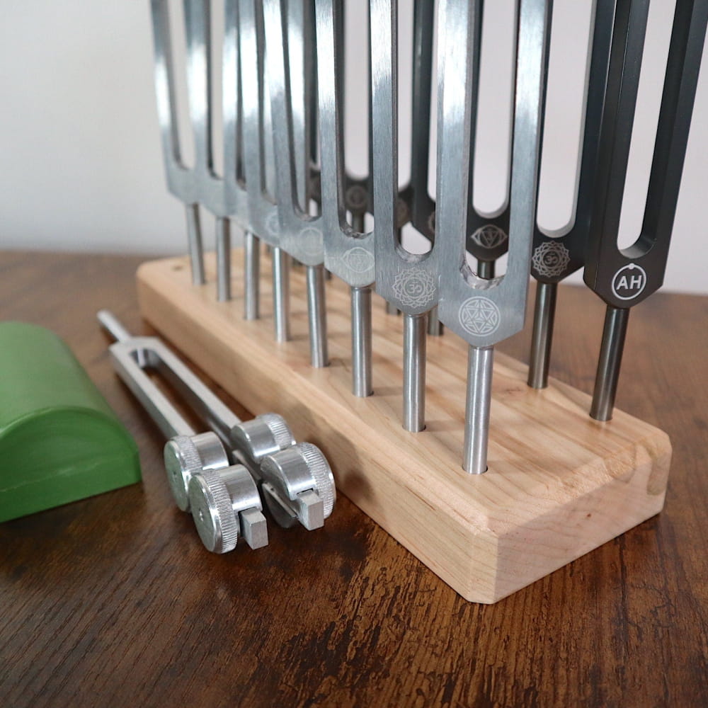 18pc Tuning Fork Set displayed in wooden holder with loose forks for Chakras and Solfeggio