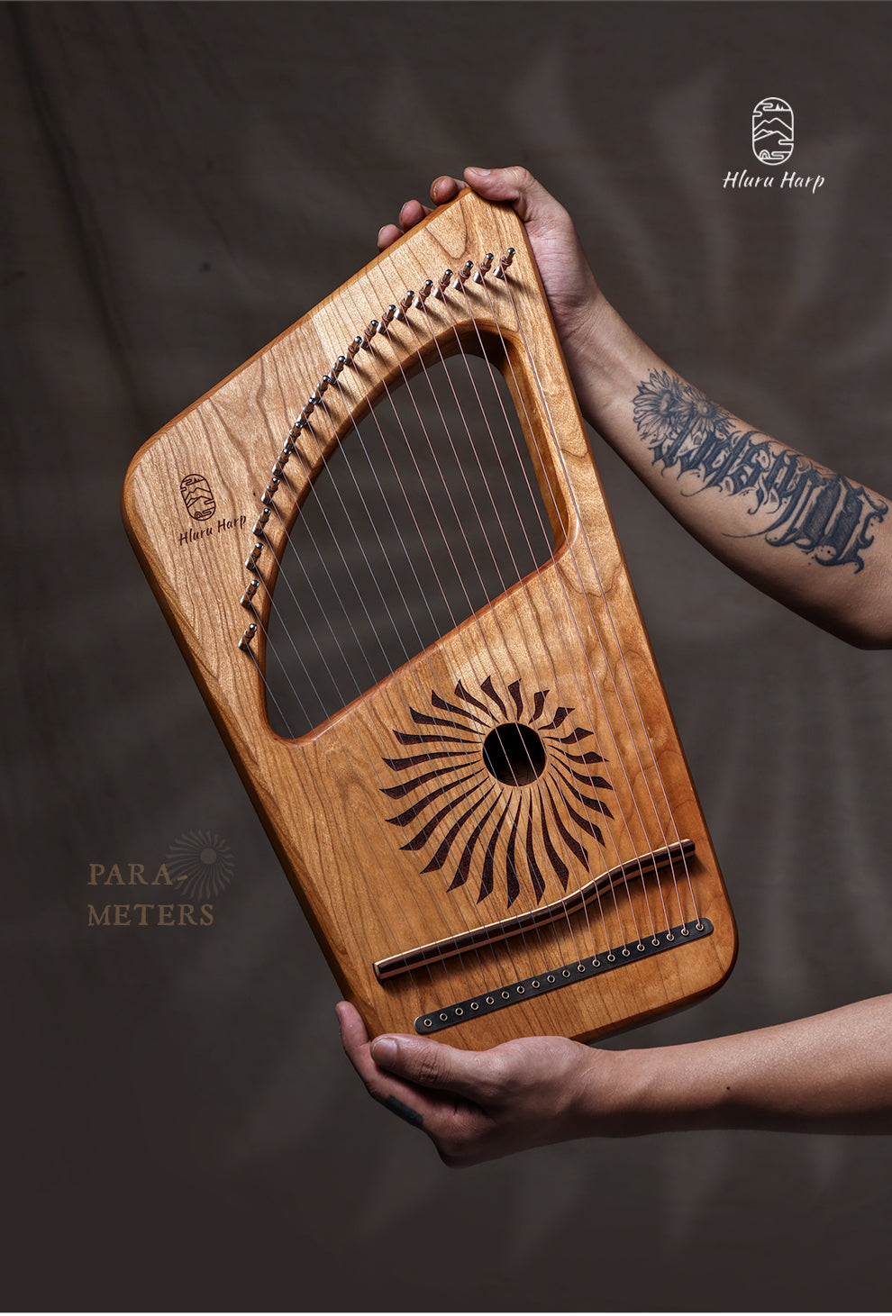 Wooden 19-String Hluru Lyre Harp with decorative sun pattern and metal strings