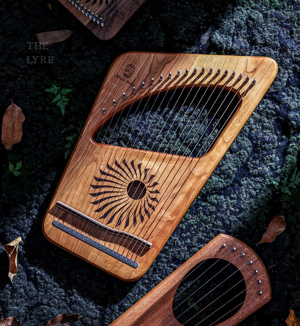 Wooden 19-String Hluru Lyre Harp with carved sun design and metal strings