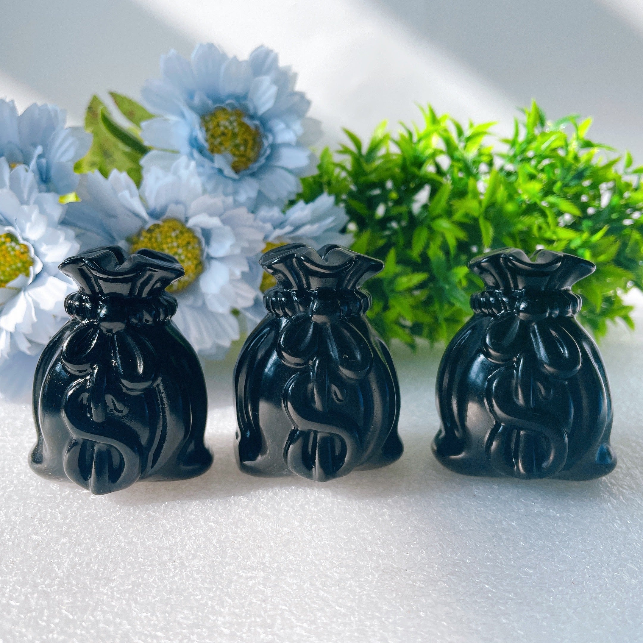 2,3 Zoll große schwarze Obsidian-Geldbeutel-Kristallfigur