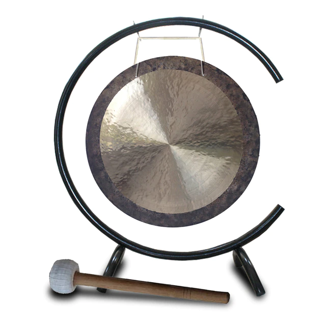 Circular gong with wooden mallet on a C-type stand for sound healing