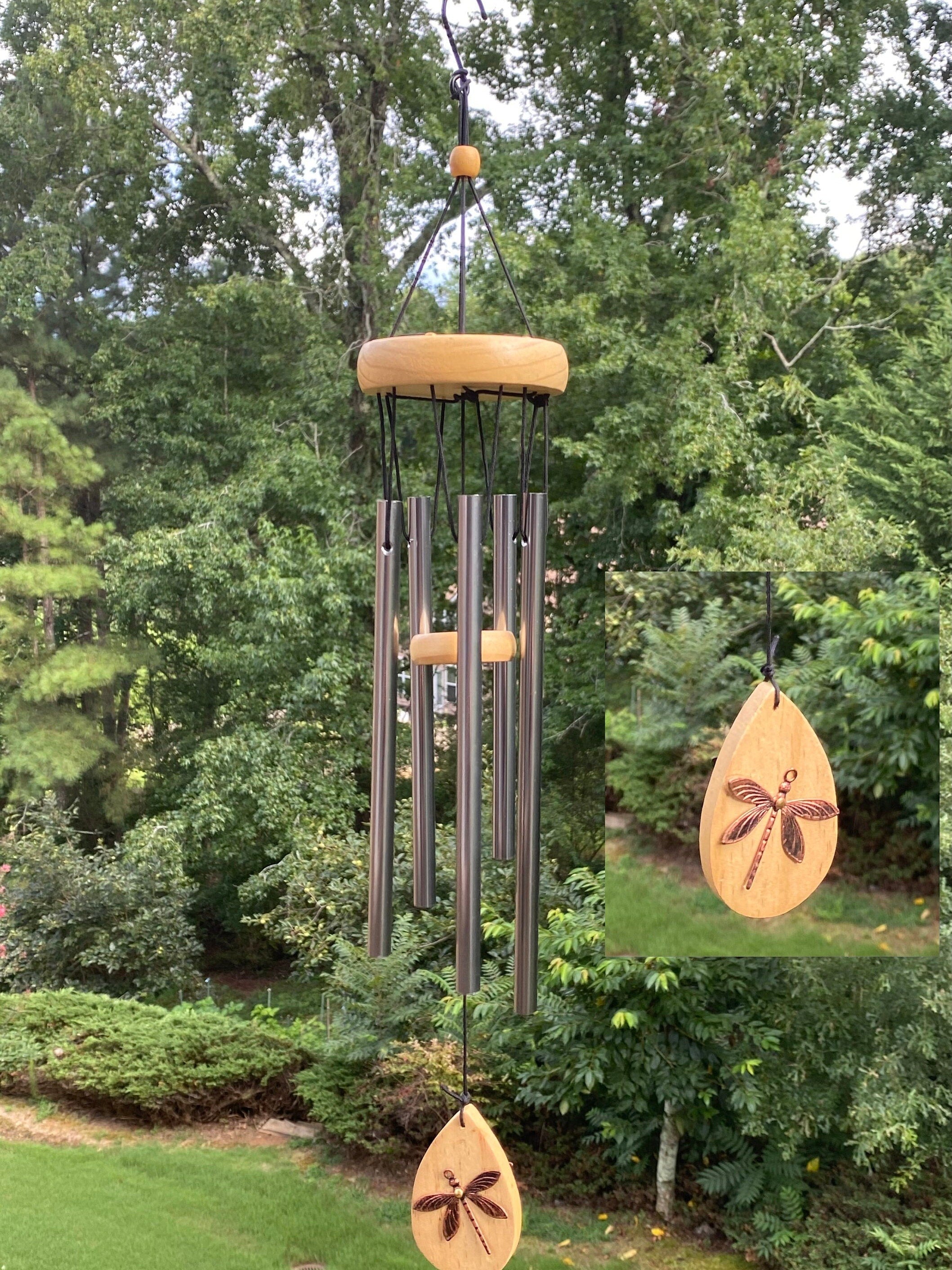 Metal wind chimes with wooden accents in a 21-inch Dragonfly Memorial design