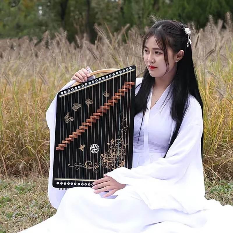Traditional Chinese Guzheng with decorative patterns and strings in 21-String model