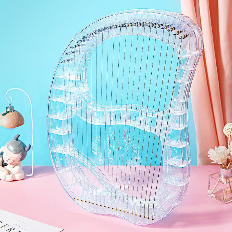 Clear acrylic hair detangling brush with flexible bristles for smooth styling