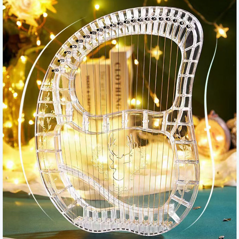 Clear acrylic 21-String Crystal Lyre Harp with string-like decorative elements