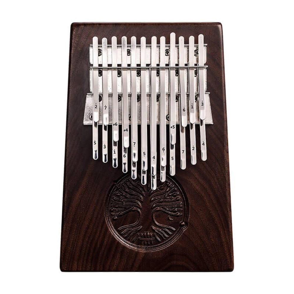 Wooden Kalimba thumb piano with metal tines and carved tree design in walnut finish